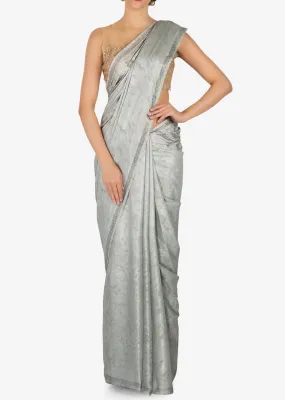 Grey saree in satin with kundan embroidered border